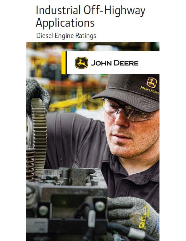 A John Deere worker wearing a hat and goggles working on a machine